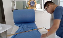 Club de Leones inició fabricación de cinco mil cubrebocas y 30 overoles