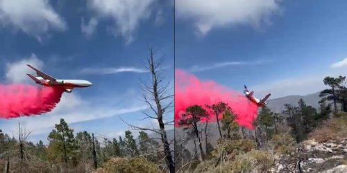 Aeronave contra incendios descarga en la sierra de Arteaga